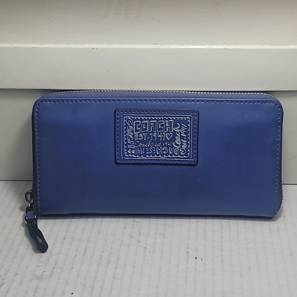 Coach Handbags - Coach blue leather zip-around wallet